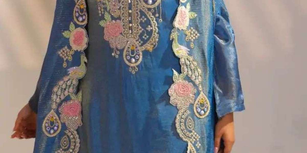 Why Does a Designer Blue Suit Attract Women in Such Numbers Today?