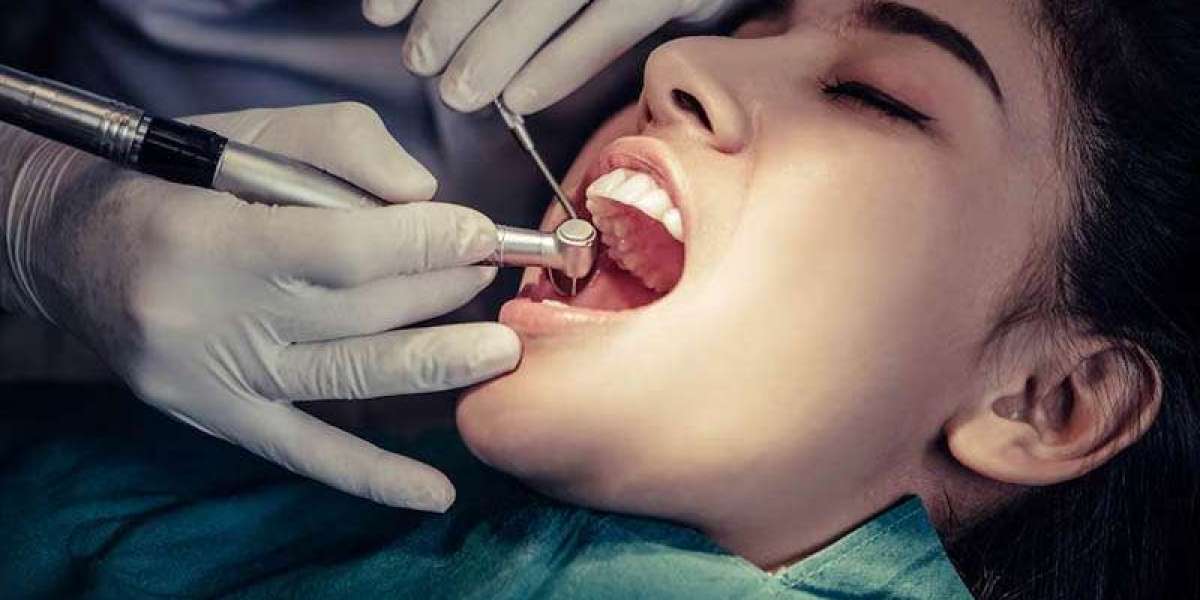 How do dentists perform root canal treatment?